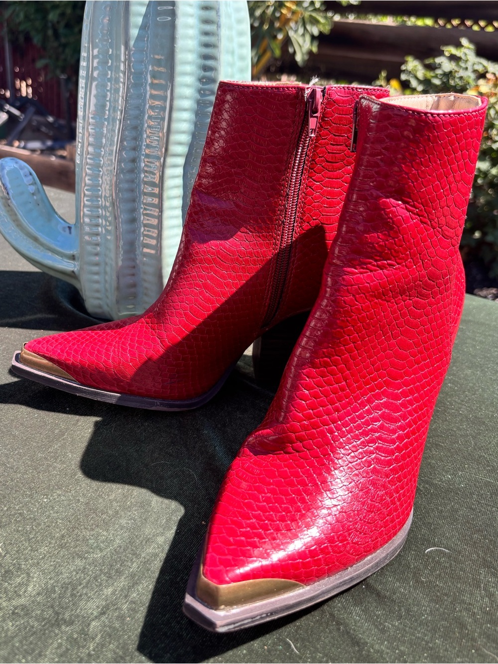 Women’s Red Textured Pointed-Toe Ankle Booties with gold metal tips